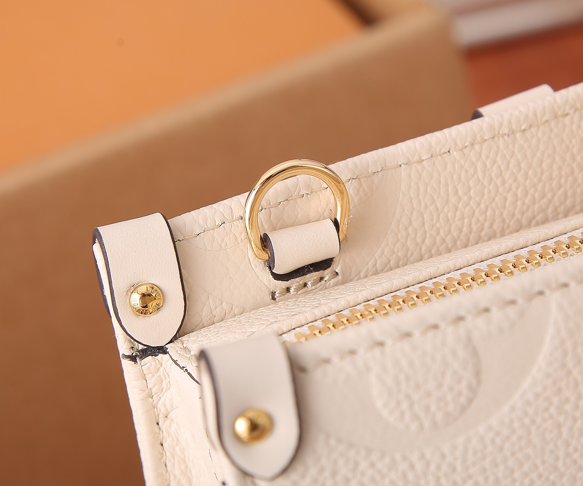 LV OnTheGo East West M23698 9.8 x 5.1 x 3.9 inches