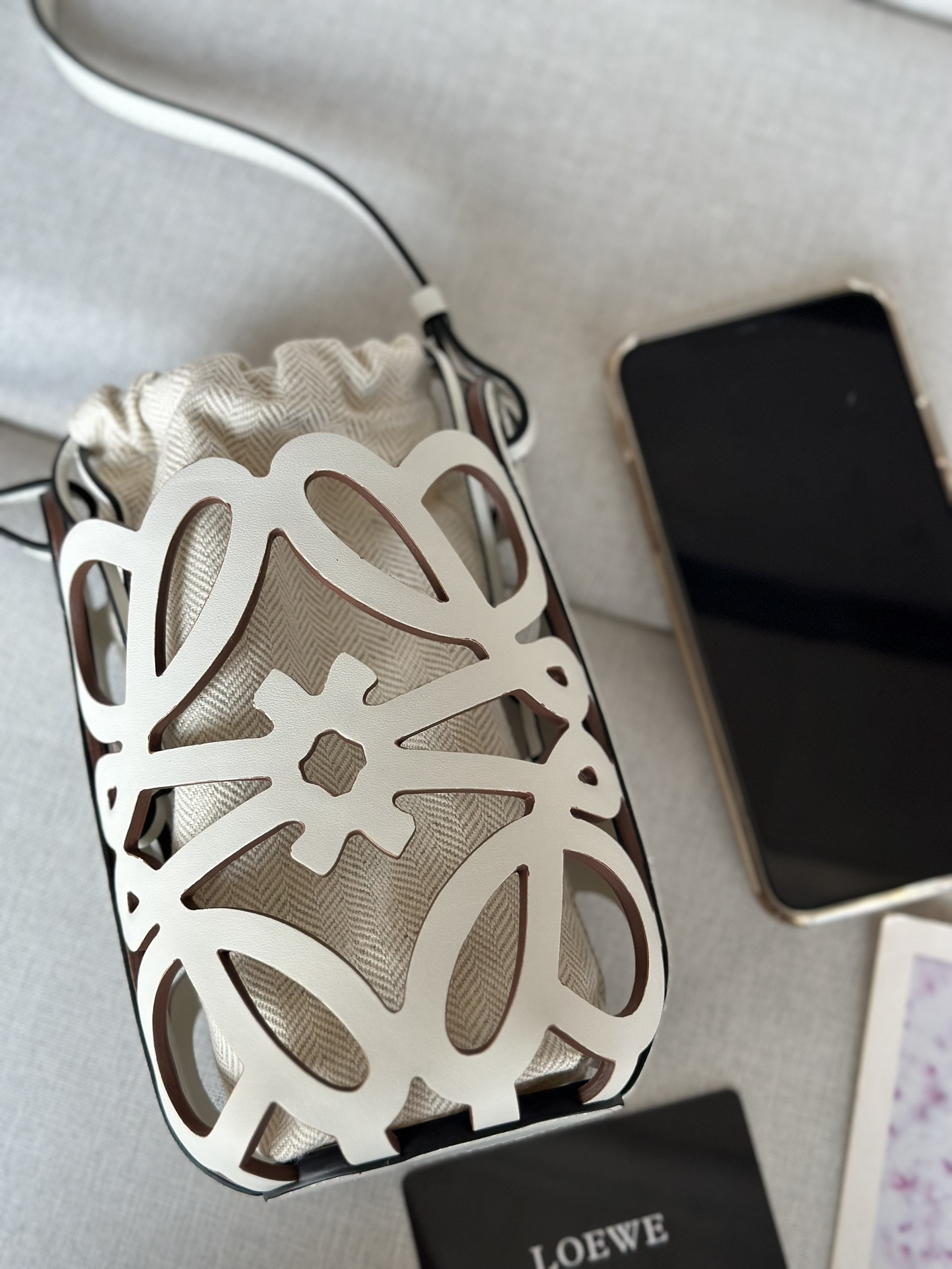 L0ew* anagram cut-out pocket in classic calfskin and canvas 20x11x8cm